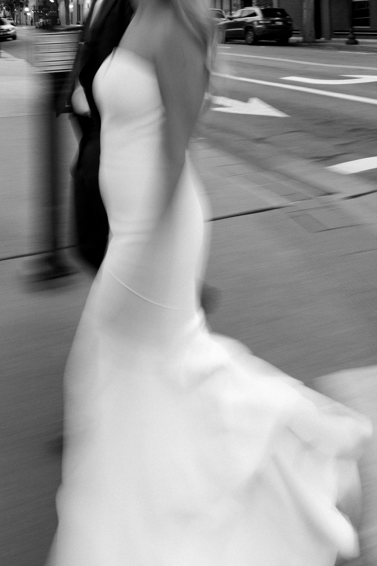 A fleeting wedding moment on the city street