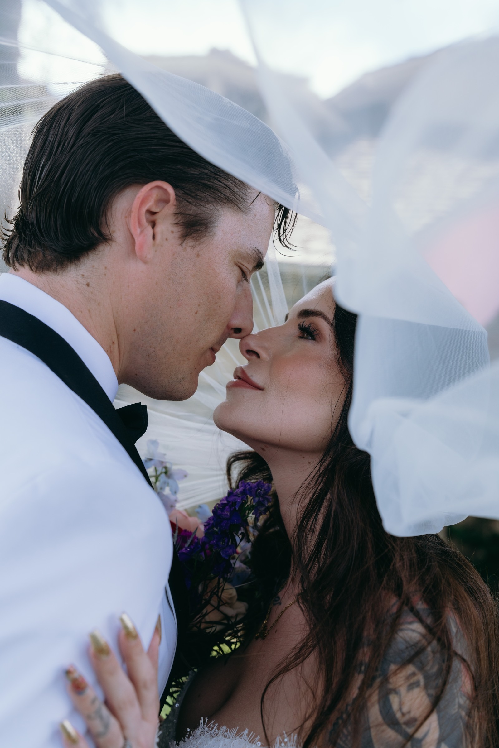 A romantic portrait beneath the bridal veil