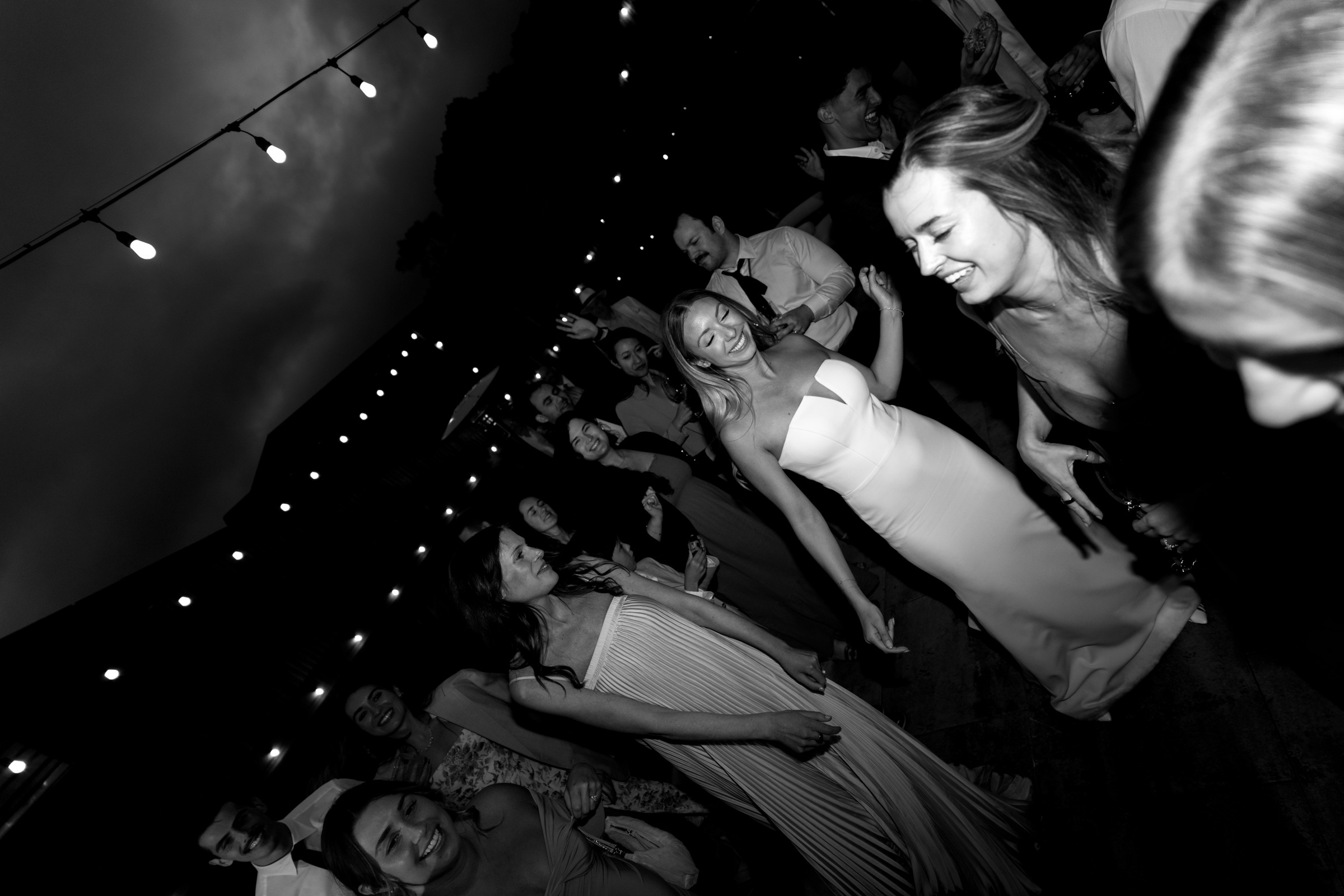 Guests and the bride celebrating on the dance floor